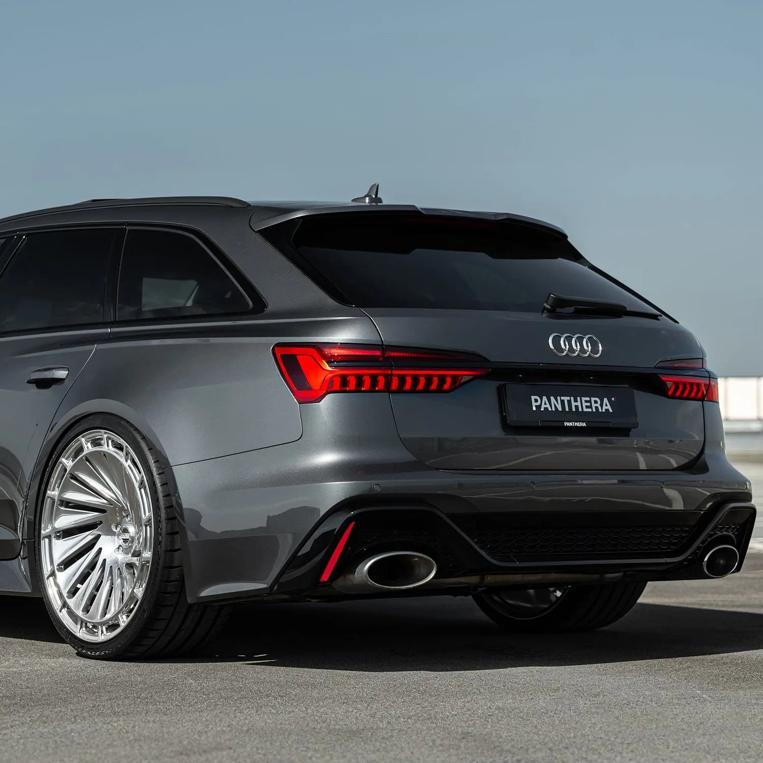 Audi RS6 C8 rear three-quarter view featuring Radi8 R808 23 inch forged rims in silver