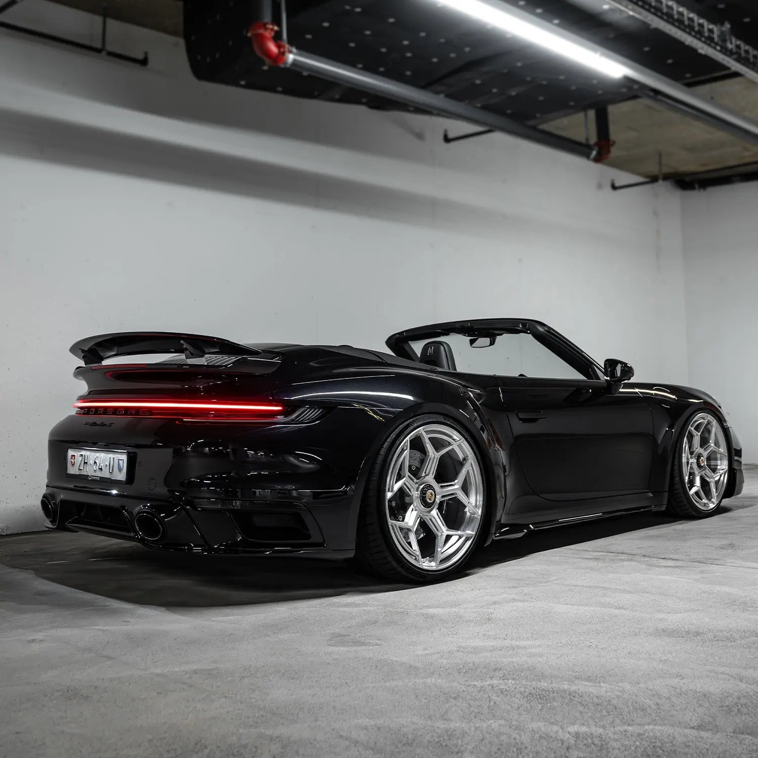 Dynamic shot Porsche 992 Turbo S on Radi8 R804.C Silver forged wheels – luxury performance fitment