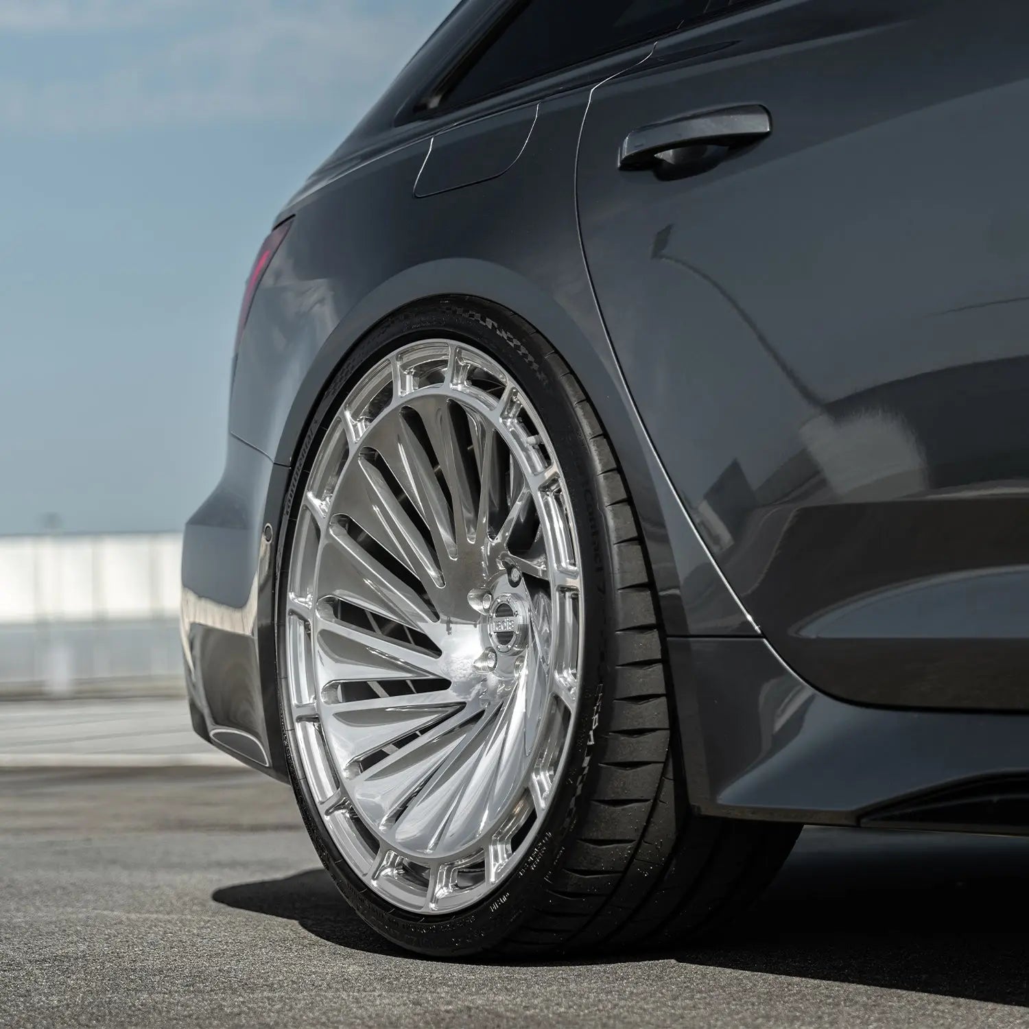 Audi RS6 C8 rear three-quarter view featuring Radi8 R807 23 inch forged rims in silver